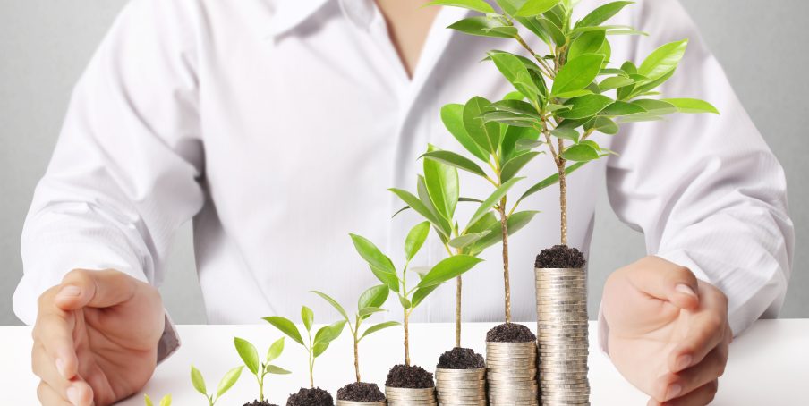 Hand put coin to money ,Business idea